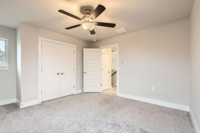 10610 Wills Loop, Austin, TX 78717 - unfurnished bedroom featuring carpet, a closet, and a ceiling fan