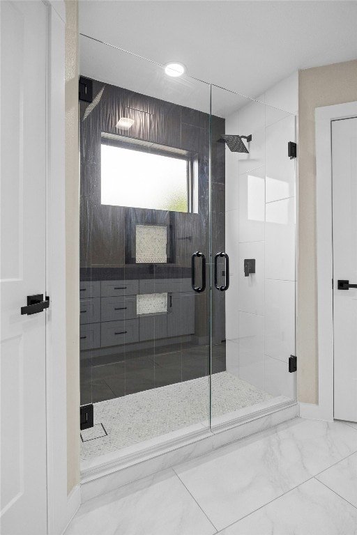 bathroom with an enclosed shower