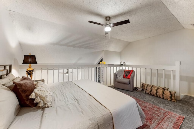 5608 Cougar Dr Unit 220, Austin, TX 78745 - carpeted bedroom with vaulted ceiling, a textured ceiling, and a ceiling fan