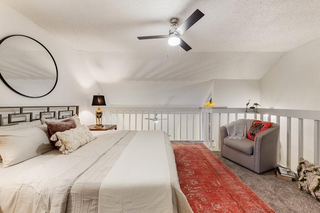 5608 Cougar Dr Unit 220, Austin, TX 78745 - bedroom with lofted ceiling, a textured ceiling, carpet flooring, and ceiling fan