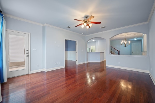 unfurnished living room with dark hardwood / wood-style flooring, ornamental molding, and ceiling fan with notable chandelier