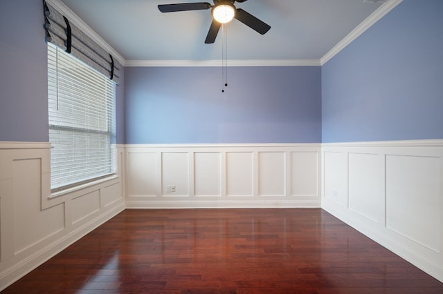 unfurnished room featuring ceiling fan, ornamental molding, and dark wood-type flooring