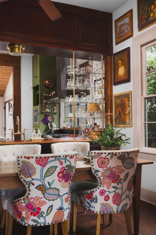 209 E Elizabeth St, Austin, TX 78704 - indoor bar with stainless steel oven and wood finished floors