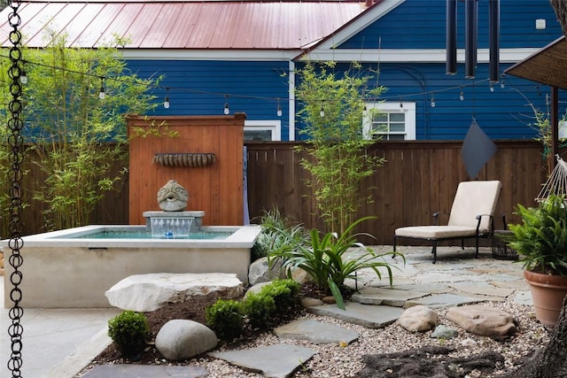 209 E Elizabeth St, Austin, TX 78704 - fenced backyard featuring a patio
