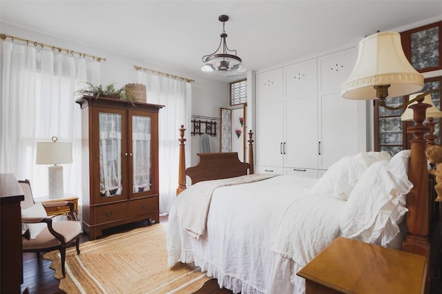 209 E Elizabeth St, Austin, TX 78704 - bedroom featuring wood finished floors