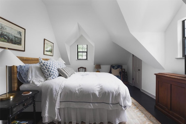 209 E Elizabeth St, Austin, TX 78704 - bedroom with lofted ceiling and wood finished floors