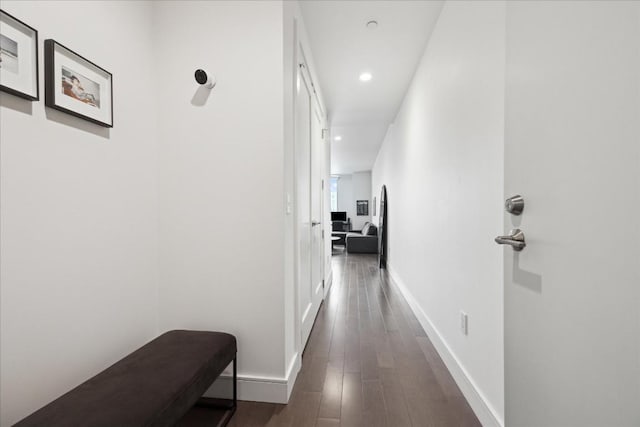 222 W Ave Unit 1312, Austin, TX 78701 - hallway featuring dark wood-style floors, baseboards, and recessed lighting