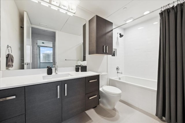 full bathroom with vanity, shower / tub combo, tile patterned floors, and toilet