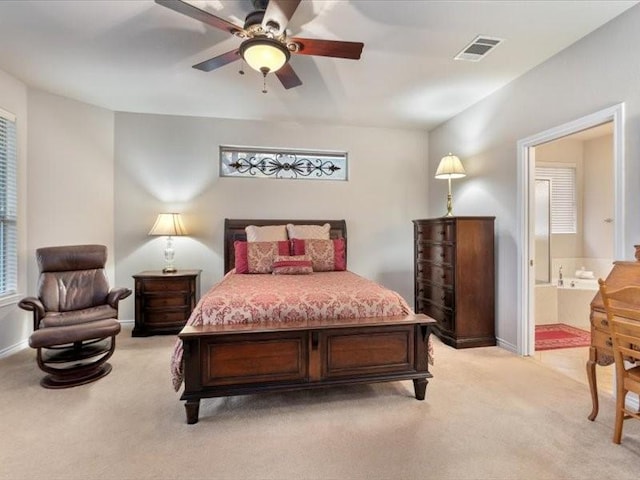 909 Big Thicket St, Georgetown, TX 78633 - bedroom with light colored carpet, ensuite bathroom, and ceiling fan