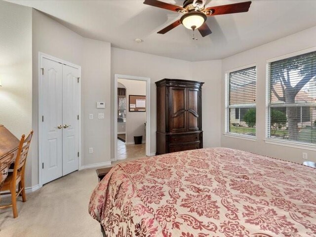 909 Big Thicket St, Georgetown, TX 78633 - bedroom featuring light carpet and a ceiling fan