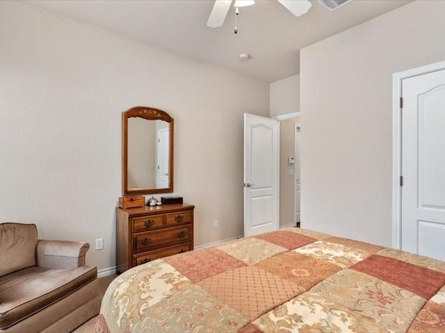 bedroom with ceiling fan and carpet