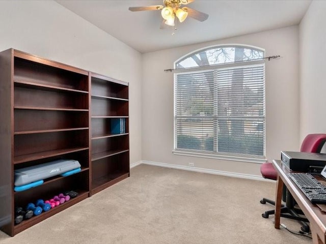 office with light colored carpet and ceiling fan