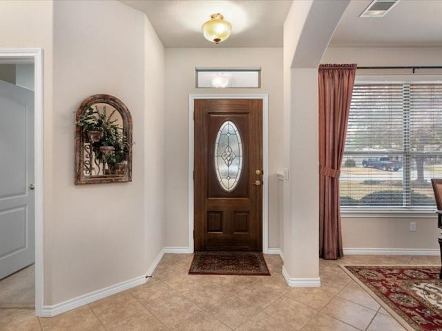 909 Big Thicket St, Georgetown, TX 78633 - foyer with plenty of natural light and light tile patterned floors