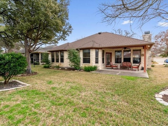 rear view of house featuring an outdoor hangout area, a lawn, ceiling fan, and a patio area