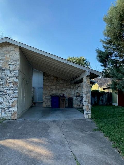 view of car parking with a carport