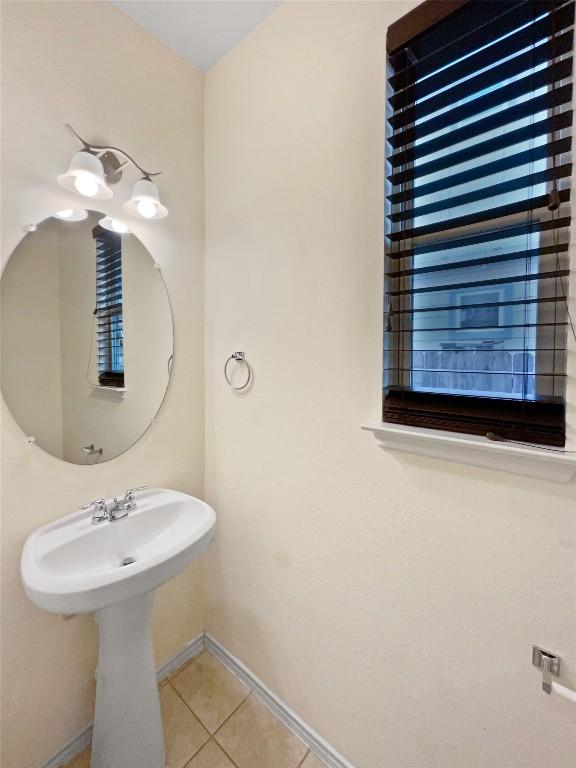 bathroom featuring tile patterned flooring