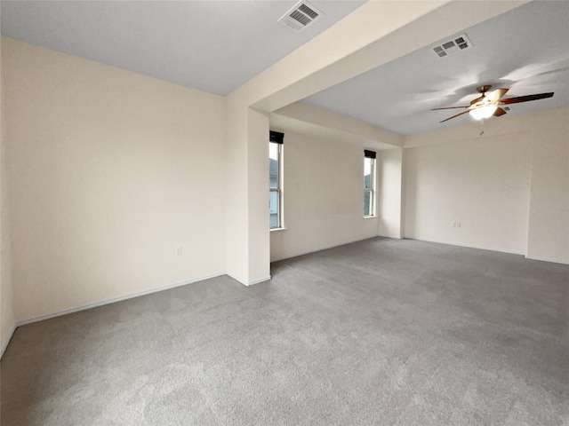 carpeted empty room with ceiling fan