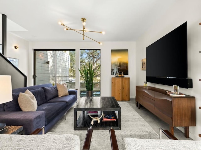 living room with a notable chandelier