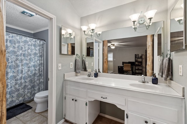 bathroom featuring vanity, a notable chandelier, a textured ceiling, and toilet