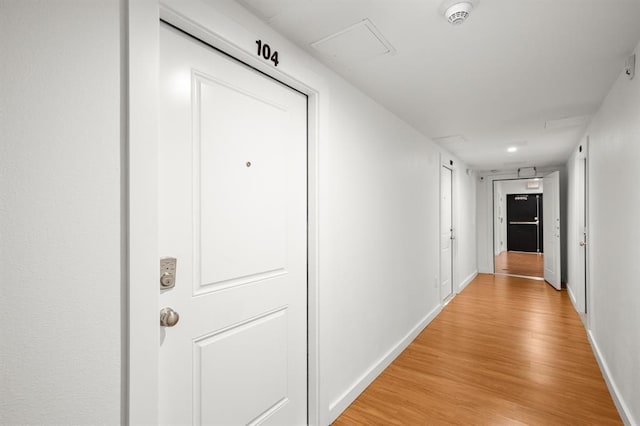 hall featuring light wood-type flooring