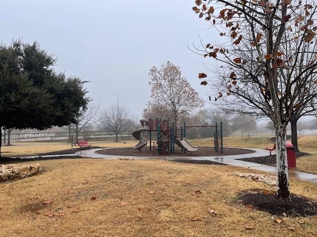 view of play area featuring a yard