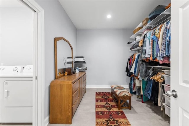 1430 Antioch Rd, Paige, TX 78659 - walk in closet featuring washer / dryer and light tile patterned flooring