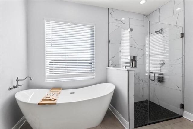 1430 Antioch Rd, Paige, TX 78659 - full bathroom featuring a marble finish shower, a soaking tub, tile patterned flooring, and recessed lighting
