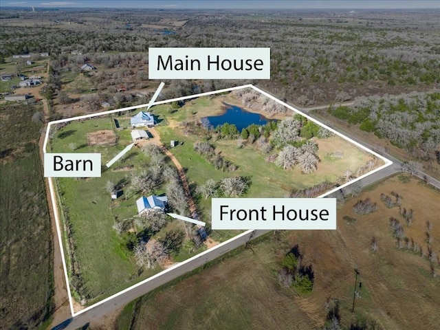 1430 Antioch Rd, Paige, TX 78659 - aerial overview of property's location with property boundaries highlighted and a nearby body of water
