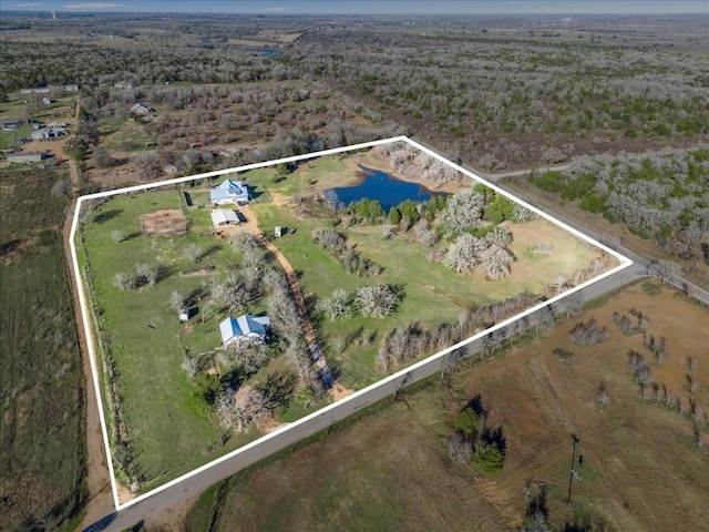 bird's eye view with a water view and a rural view