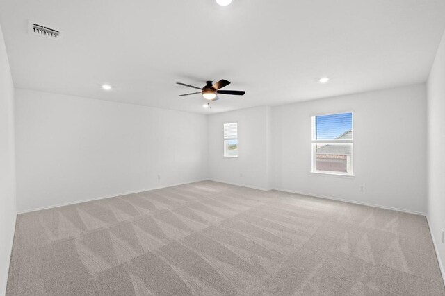 4829 Mozzafiato Ln, Round Rock, TX 78665 - empty room featuring carpet, a ceiling fan, and recessed lighting