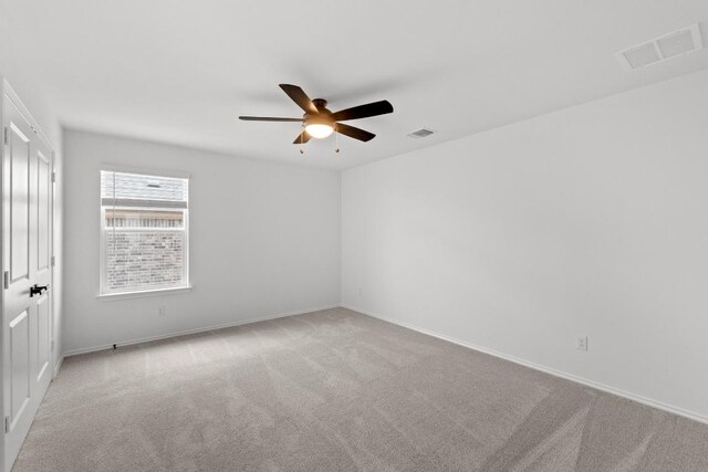 4829 Mozzafiato Ln, Round Rock, TX 78665 - carpeted empty room with a ceiling fan and baseboards