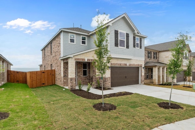 traditional-style house with fence, concrete driveway, brick siding, a front yard, and a garage