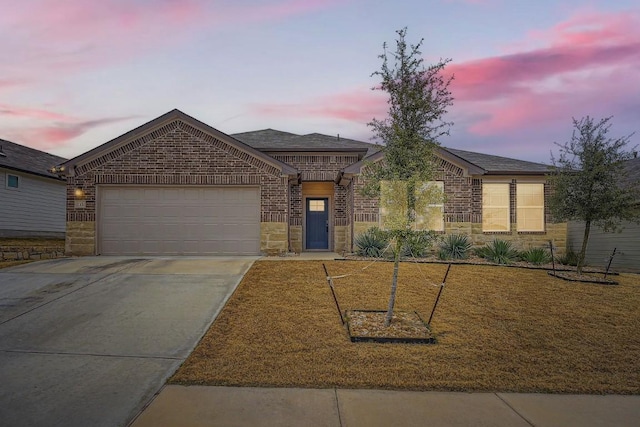 view of front of home with a garage