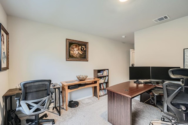 home office with light colored carpet