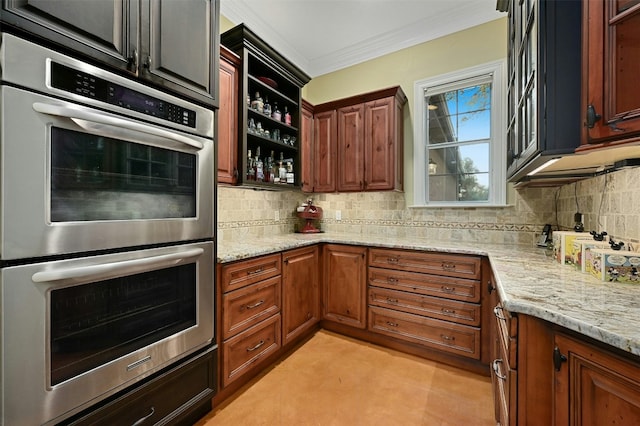 kitchen with tasteful backsplash, ornamental molding, light stone countertops, and double oven