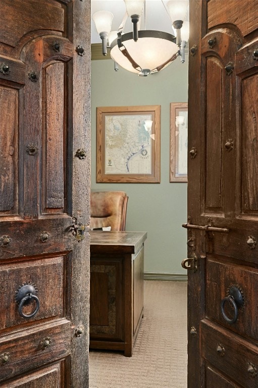 bathroom featuring an inviting chandelier