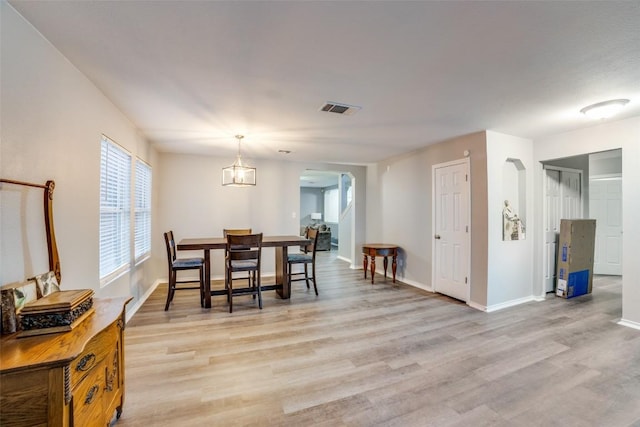 dining room with light wood-type flooring