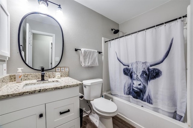 full bathroom with vanity, wood-type flooring, toilet, and shower / tub combo with curtain