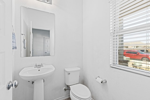 11813 Carrizo Springs Path, Manor, TX 78653 - bathroom featuring toilet and baseboards