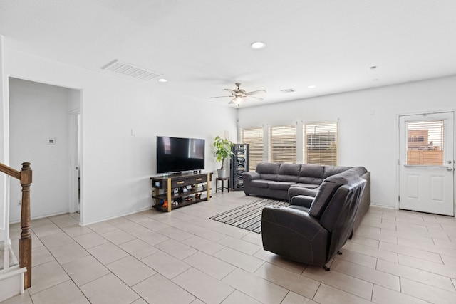 11813 Carrizo Springs Path, Manor, TX 78653 - living room featuring a ceiling fan, recessed lighting, stairway, and light tile patterned flooring