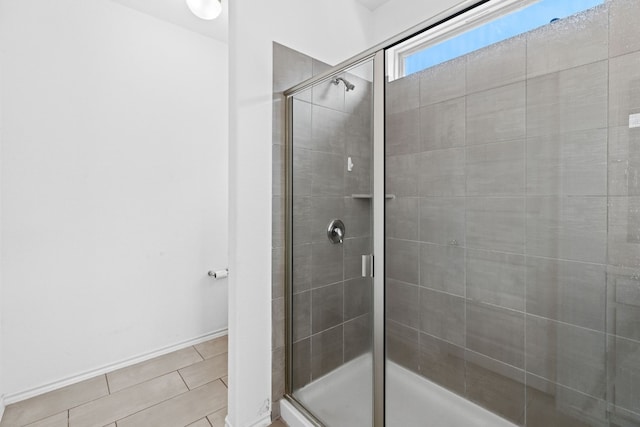 11813 Carrizo Springs Path, Manor, TX 78653 - bathroom featuring a shower stall and tile patterned floors