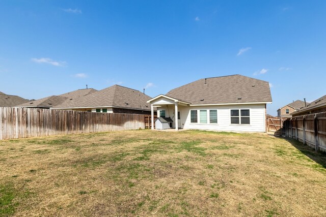 11813 Carrizo Springs Path, Manor, TX 78653 - rear view of property with a fenced backyard