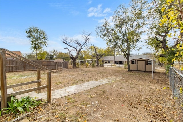 view of yard with a storage shed