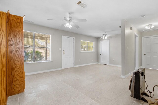 501 Hill St, Copperas Cove, TX 76522 - empty room featuring a ceiling fan and attic access