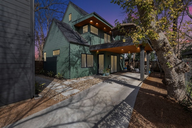 view of front of home with a carport