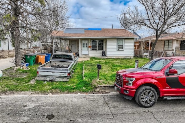 view of front of home with a front yard