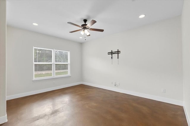 spare room with ceiling fan