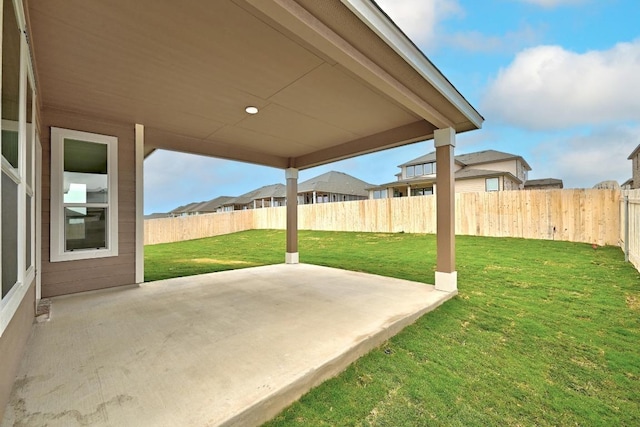 view of yard featuring a fenced backyard and a patio