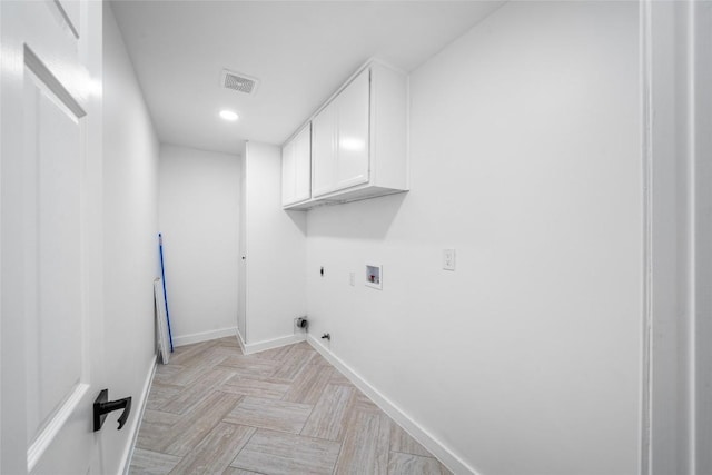 3507 Lovage Dr, Austin, TX 78727 - laundry area featuring cabinet space, washer hookup, gas dryer hookup, electric dryer hookup, and recessed lighting
