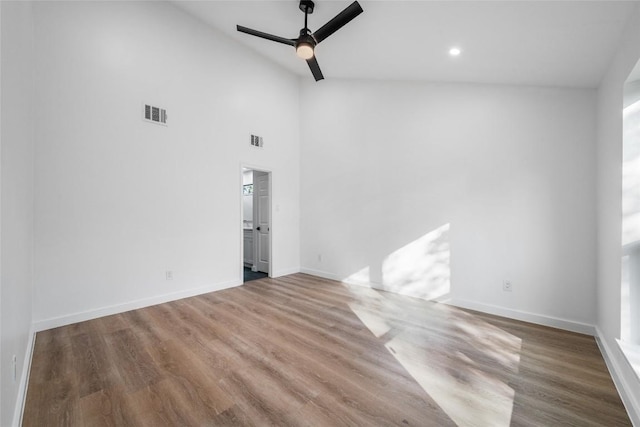 3507 Lovage Dr, Austin, TX 78727 - empty room featuring ceiling fan, wood finished floors, recessed lighting, and high vaulted ceiling